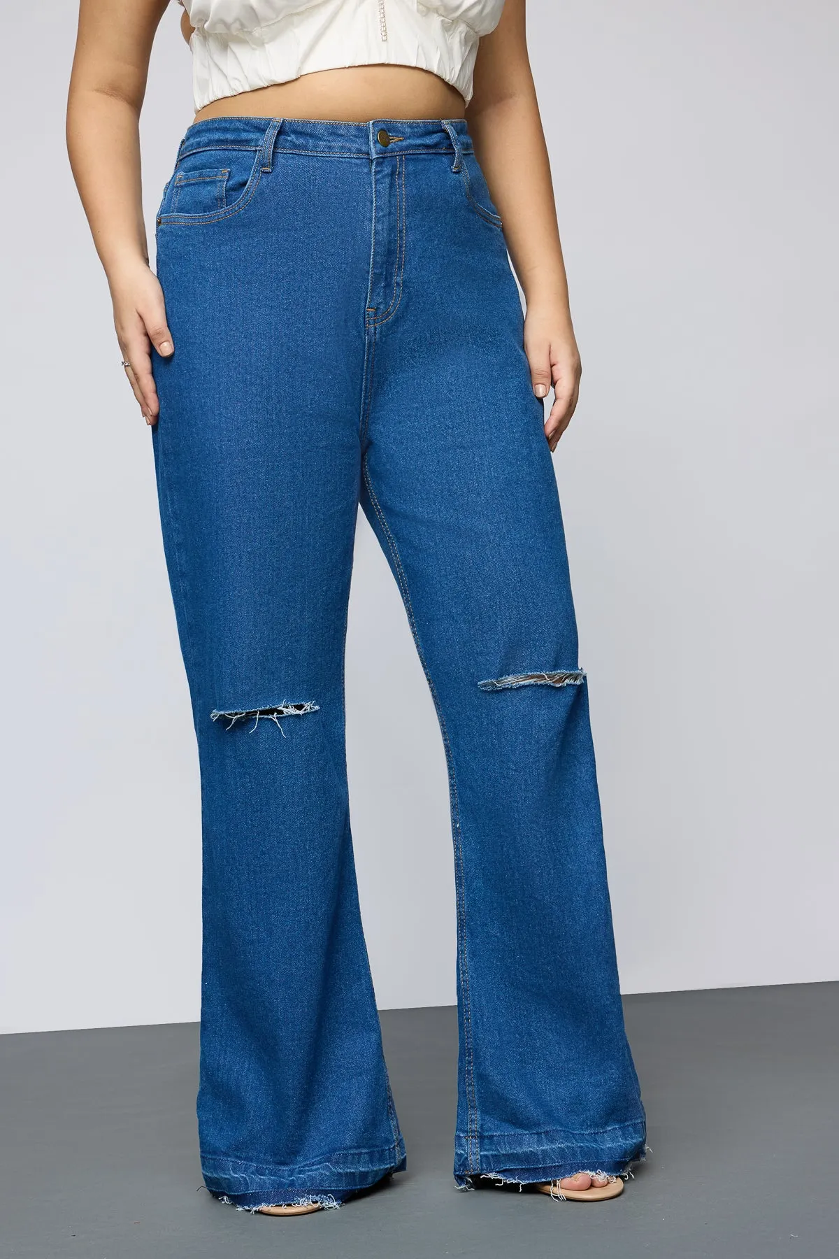 Retro Revival Distressed Curve Bootcut Jeans