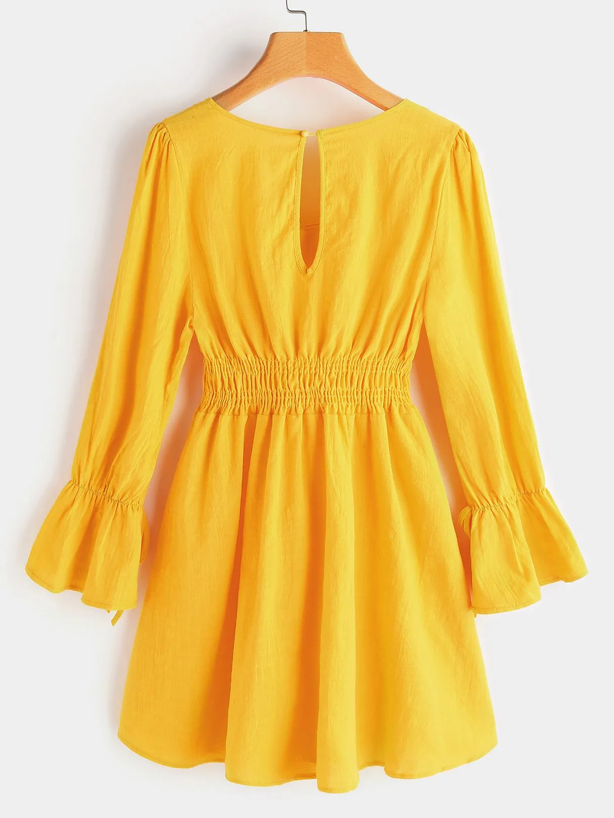 Wholesale Scoop Neck Plain Cut Out Pleated Self-Tie Long Sleeve Ruffle Hem Yellow Casual Dresses